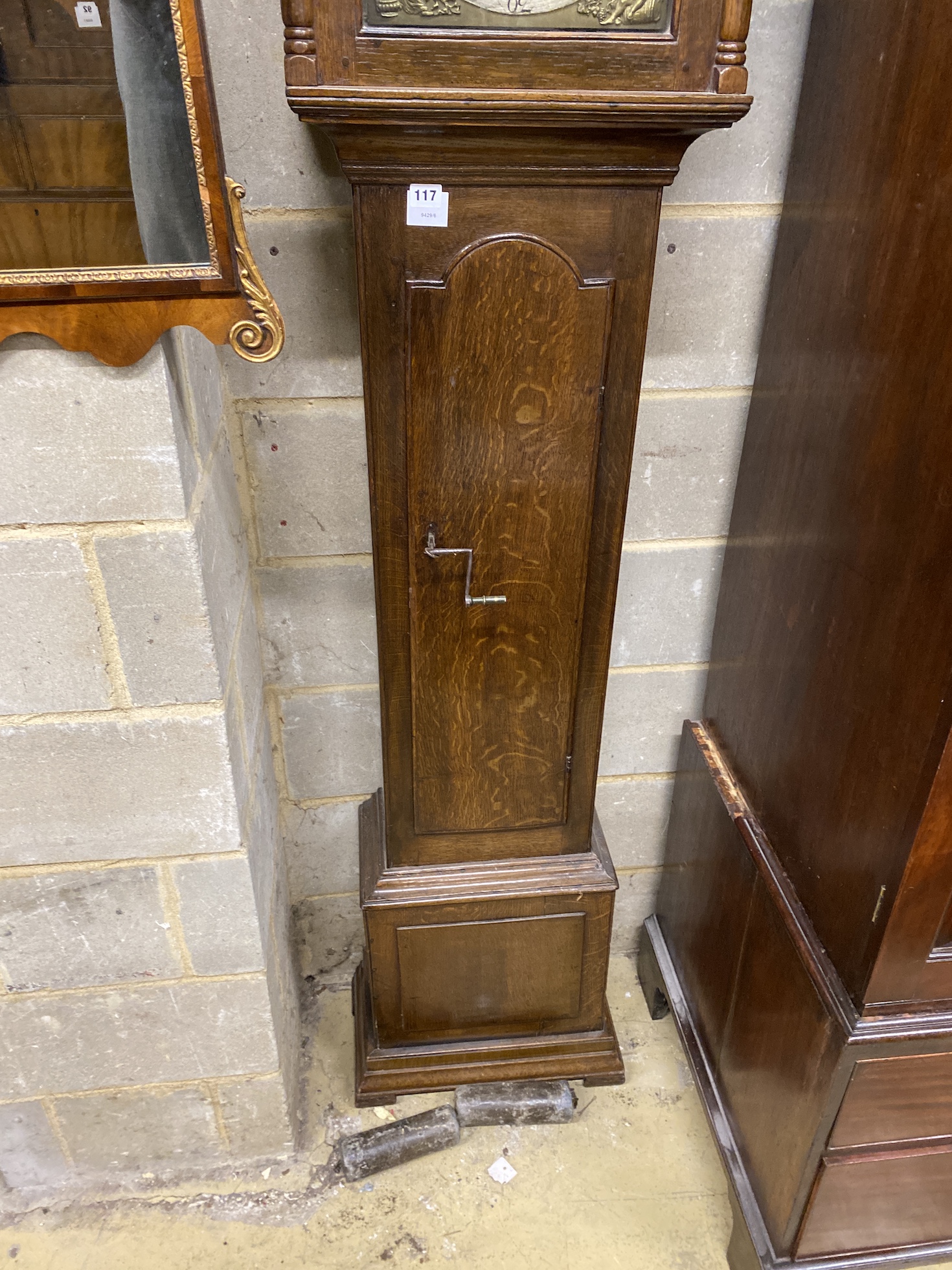 A mid 18th century oak eight day longcase clock, marked John Burton of Norton, height 200cm